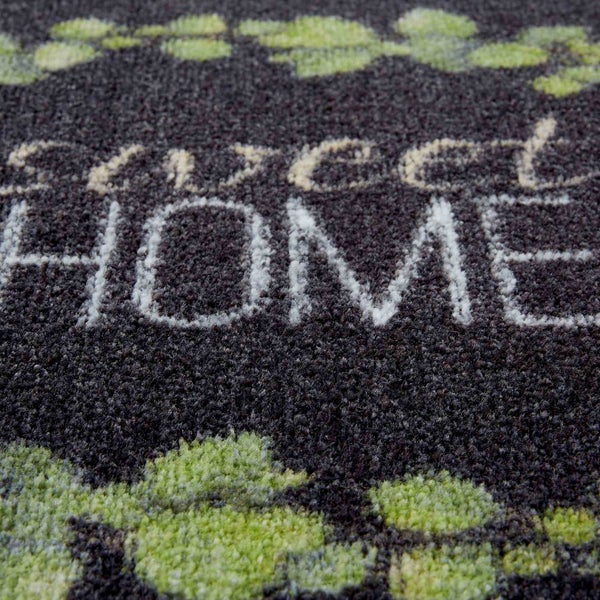 Fußmatte mit dem Schriftzug 'Sweet Home' und floralem Muster