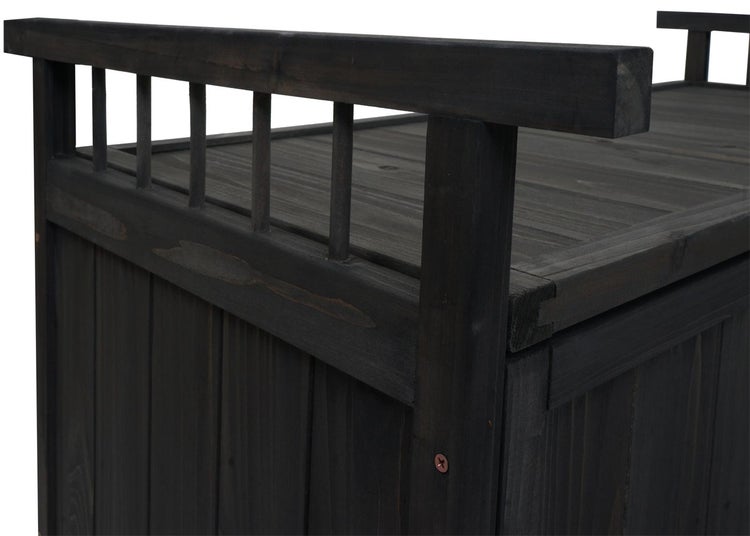 Detailansicht einer dunklen Gartenbank mit Stauraum aus Holz