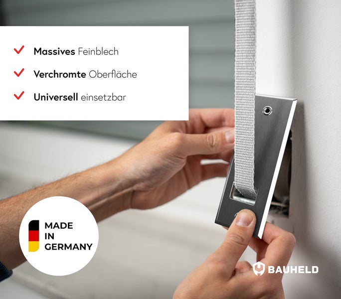 Detailaufnahme eines Rollladengurtwicklers aus massivem Feinblech mit verchromter Oberfläche und dem Made in Germany Siegel