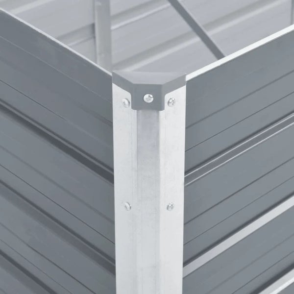 Detailaufnahme der Eckverbindung eines Hochbeets aus Metall mit Wellblechprofilen und Schrauben.