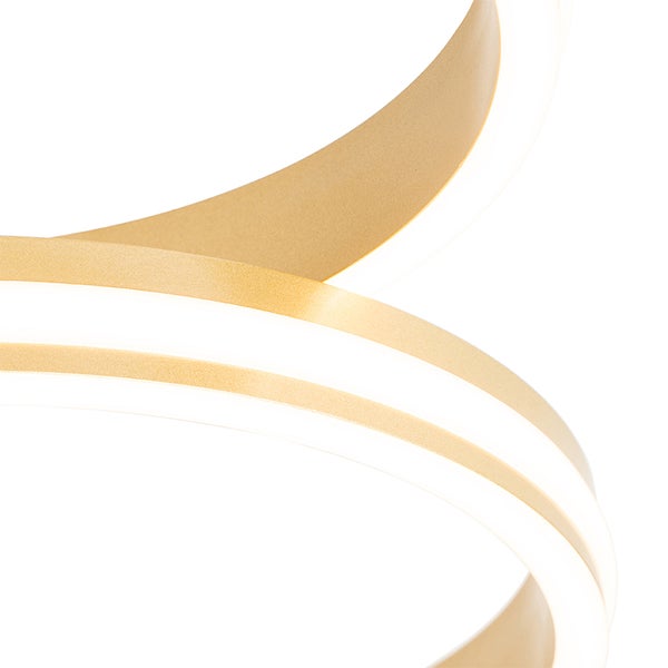 Detailaufnahme einer modernen LED-Deckenleuchte mit geschwungenem Design