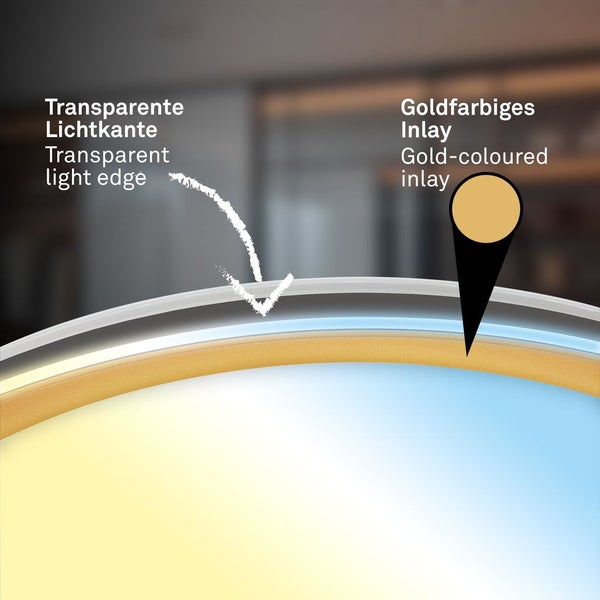 Detailansicht eines Spiegels mit transparenter Lichtkante und goldfarbenem Inlay.