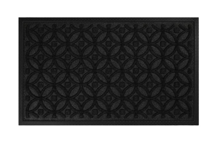 Rechteckige schwarze Fußmatte mit geometrischem Muster aus überlappenden Kreisen.