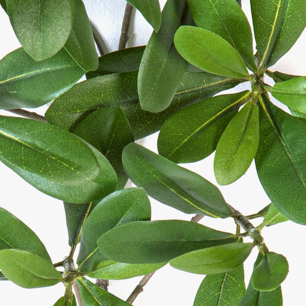 Künstliche Skabiose in Lila mit mehrlagigen Blütenblättern und grünem Zentrum an einem Stiel.