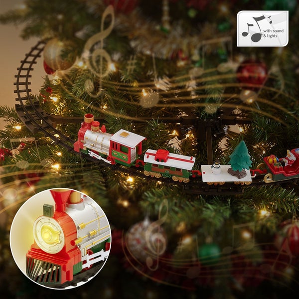 Weihnachtsbaum-Eisenbahn mit Licht und Sound auf Schienen montiert