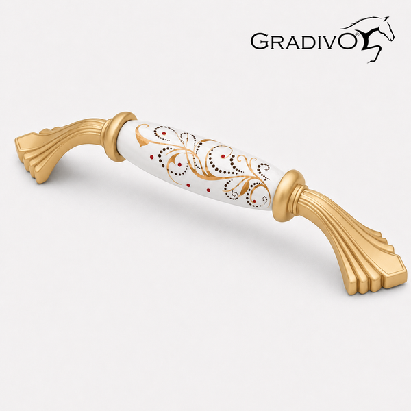Goldfarbener Möbelgriff aus Metall und weißer Keramik mit floralem Ornament-Dekor, Gradivo Logo.