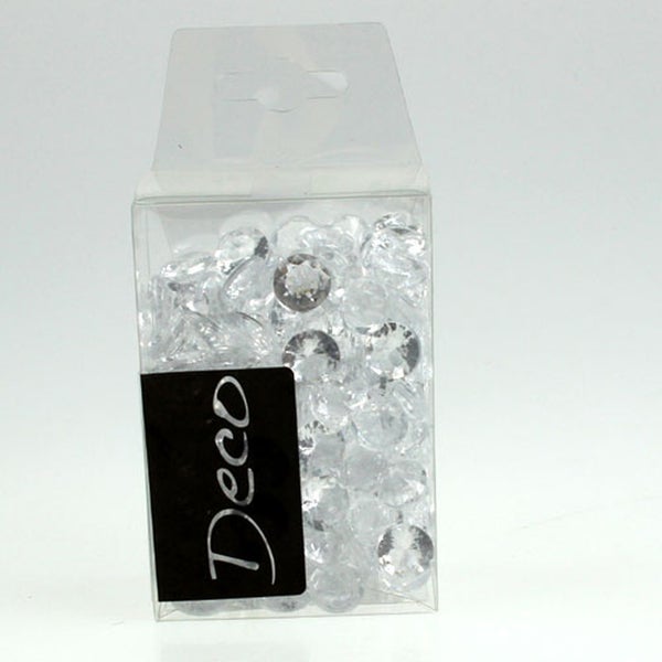 Transparente Dekosteine in Diamantform in einer Kunststoffbox.