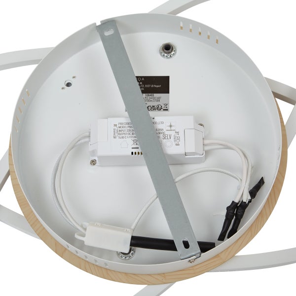 Innenansicht einer Deckenleuchte mit elektronischen Bauteilen und Kabeln