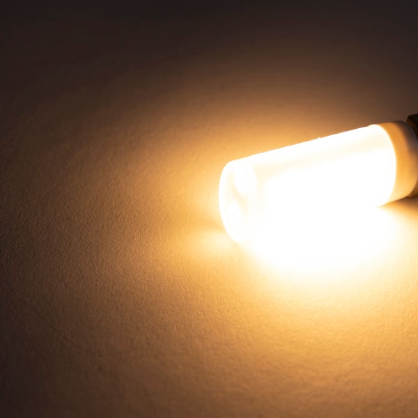 Leuchtende LED-Stiftsockellampe mit warmweißem Licht.