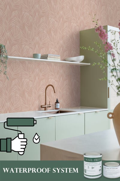 Küchenszene mit rosa Tapete, grünen Schränken und dem Text "Waterproof System"