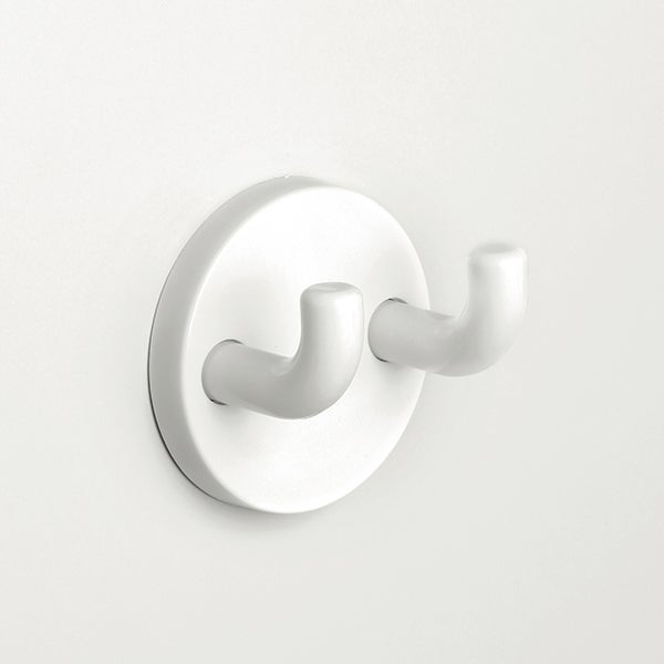 Weißer Doppelwandhaken aus Kunststoff mit runder Basis.