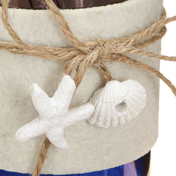 Dekoration mit Seestern, Muschel und Juteseil