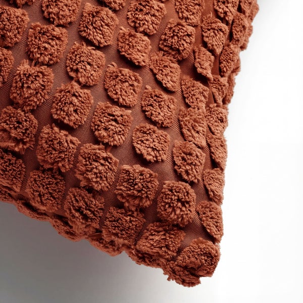 Dekokissen mit Noppenmuster