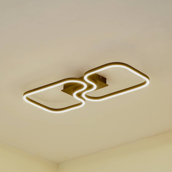 Moderne LED-Deckenleuchte aus goldfarbenem Metall mit zwei quadratischen, abgerundeten Leuchtelementen.