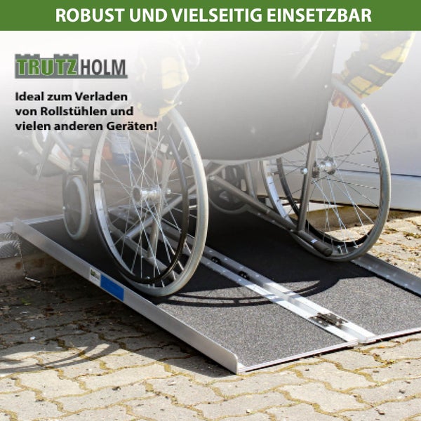 Tragbare Rampe mit Rollstuhl für den barrierefreien Zugang