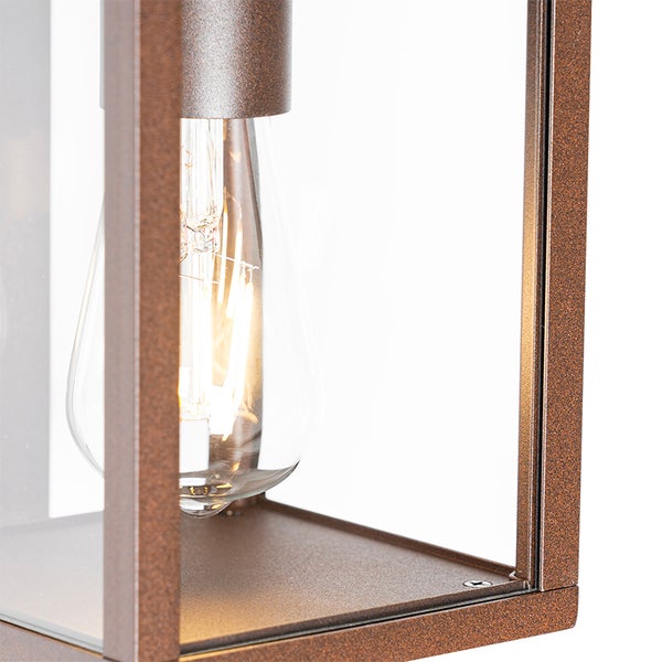 Detailansicht einer quadratischen Außenleuchte aus braunem Metall und Glas mit einem Leuchtmittel im Edison-Stil.