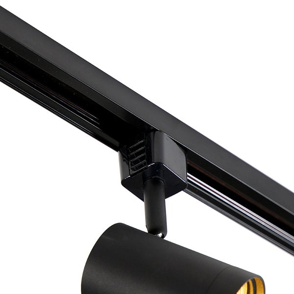 Schwarzes Schienensystem aus Metall mit einem verstellbaren Spotstrahler.