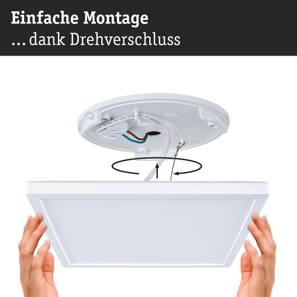 Montage einer quadratischen Deckenleuchte mit Drehverschluss-System an einer runden Basis mit sichtbarer Verkabelung.