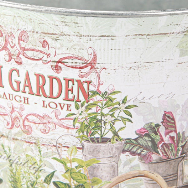 Detailansicht eines Pflanzgefäßes mit Gartenmotiv