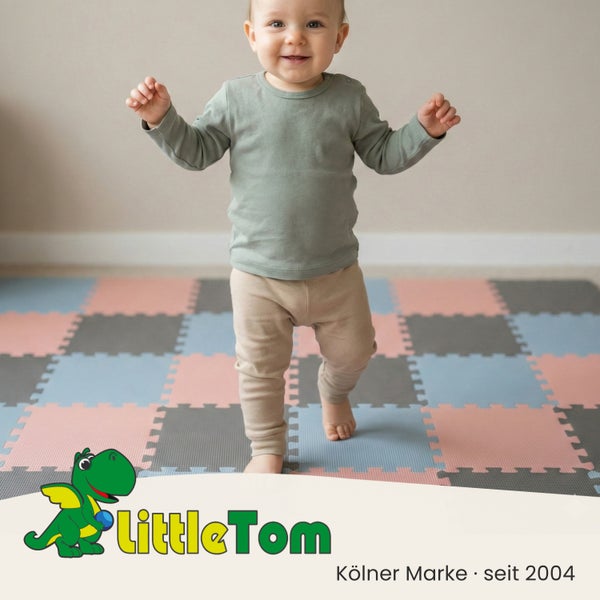 Ein Baby läuft auf einer LittleTom Puzzlematte aus Schaumstoff mit ineinandergreifenden Elementen.