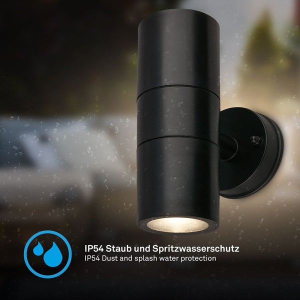 Zylindrische schwarze Außenwandleuchte mit IP54 Staub- und Spritzwasserschutz.