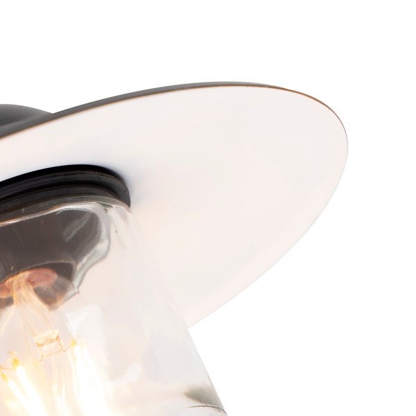Detailansicht einer Außenwandleuchte mit klarem Glaszylinder und weißem Reflektorschirm.