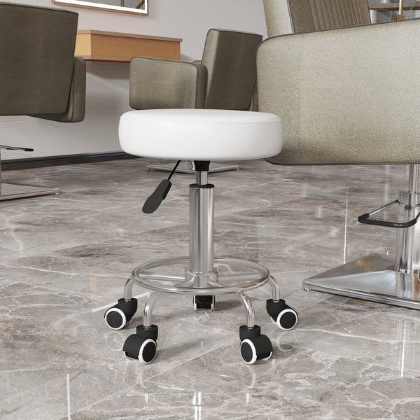 Rollhocker mit rundem Polstersitz und verstellbarem Metallgestell auf fünf leichtgängigen Rollen in einem modernen Salon.