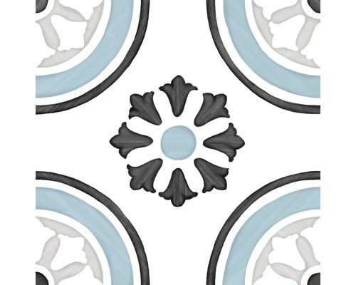 Dekorative Bodenfliese mit Ornamentmuster in Weiß, Schwarz und Hellblau im Vintage Stil.