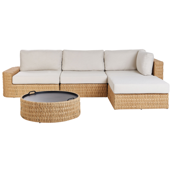 Garten-Lounge-Set mit Ecksofa aus Geflecht, Sitz- und Rückenkissen sowie einem runden Couchtisch.
