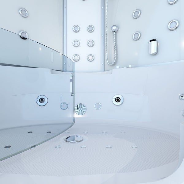 Innenansicht einer hellen Whirlpool-Duschkabine mit mehreren Massagedüsen, einer transparenten Glastür und einer Handbrause mit Schlauch.