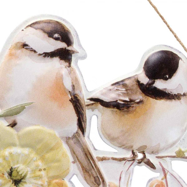 Dekoratives Fensterbild mit Vogelmotiven.