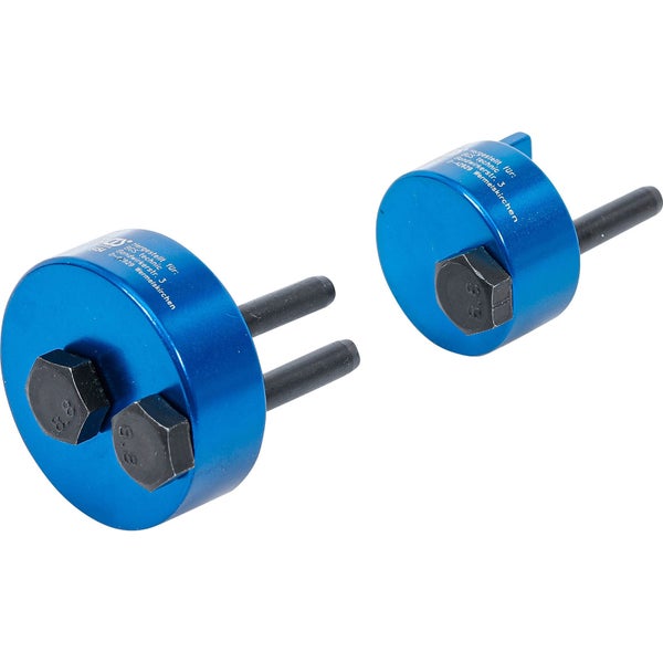 Zwei blaue Werkzeuge zur Motorreparatur