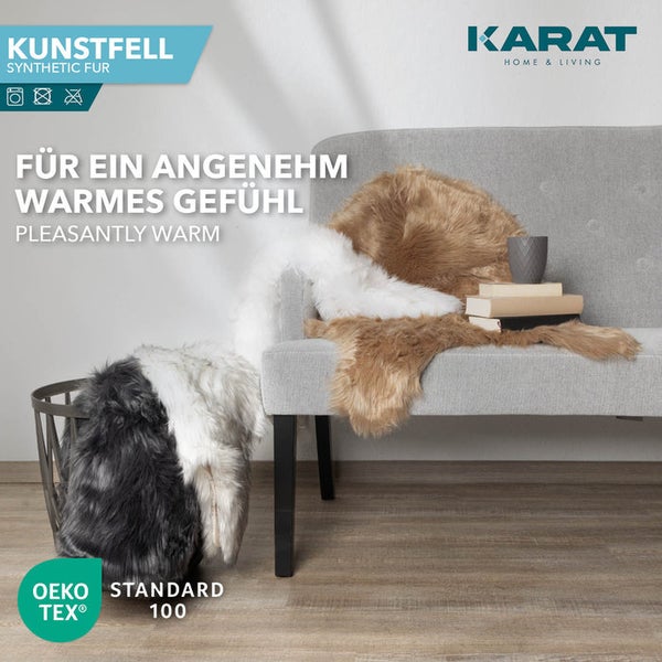 Kunstfelle auf Sofa und in Korb. Maschinenwäsche, kein Trockner oder Bügeln, OEKO-TEX Standard 100, Karat Home and Living Logo.