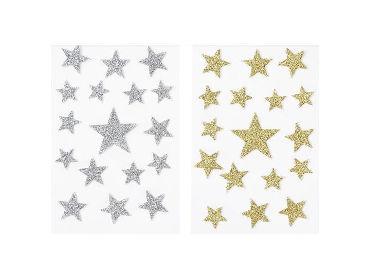 Bogen mit glitzernden Sternaufklebern in verschiedenen Größen als Dekoration.
