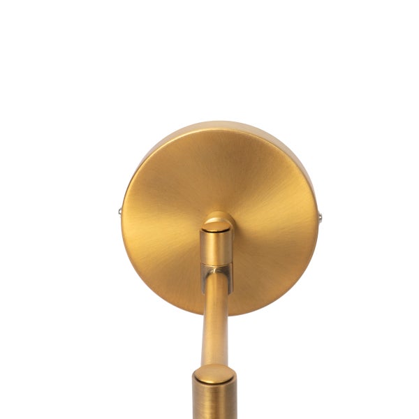 Wandhalterung einer Leuchte aus Metall in Messing-Optik mit rundem Sockel und verstellbarem Arm.