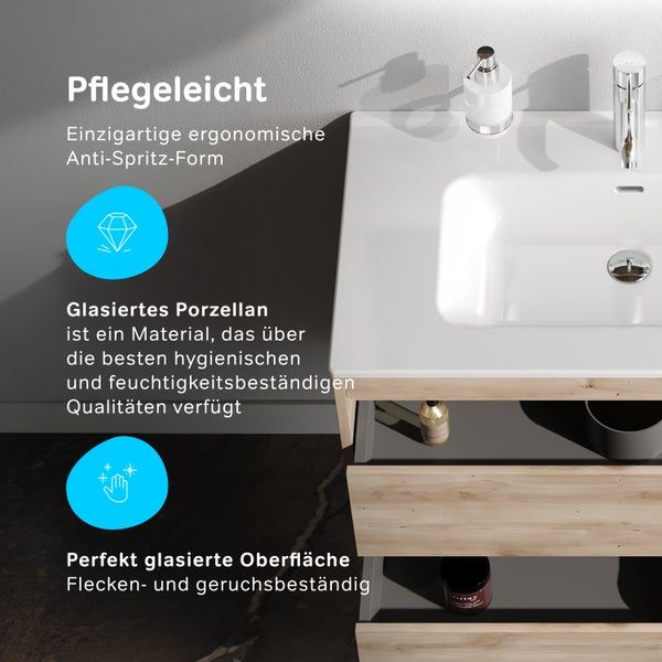 Detailansicht eines Waschtisches aus glasiertem Porzellan mit ergonomischer Anti-Spritz-Form und flecken- sowie geruchsbeständiger Oberfläche.