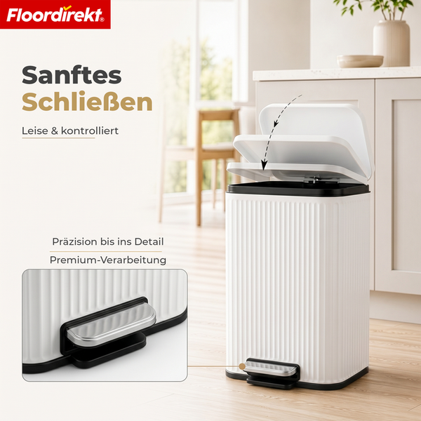 Weißer Tretabfalleimer mit Soft-Close Deckel, geriffelter Oberfläche und Pedal in einer Küche, Floordirekt Logo.