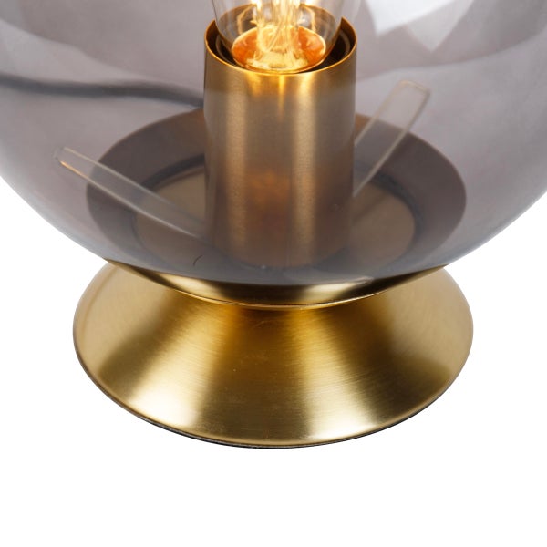 Tischleuchte mit einem Lampenschirm aus Glas und einem Sockel aus Metall