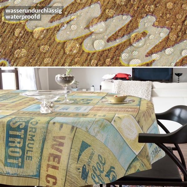 Abwaschbare Tischdecke mit Bistro-Motiv im Holz-Design, Detailansicht der wasserundurchlässigen Oberfläche mit Wassertropfen.