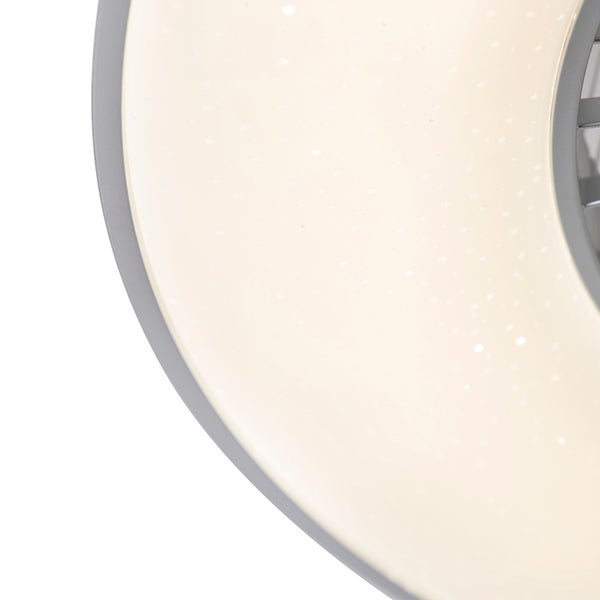 Detailaufnahme einer runden LED-Deckenleuchte mit Sternenhimmel-Effekt und mattgrauem Rahmen.