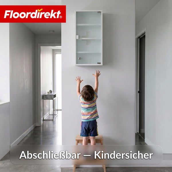 Floordirekt Logo. Abschließbarer Medizinschrank mit Glastür im Flur, kindersicher an der Wand montiert.