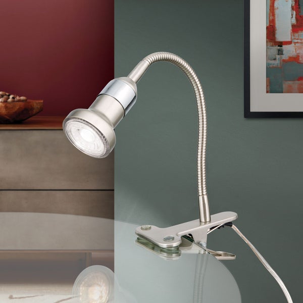 Klemmlampe mit flexiblem Arm auf einem Tisch
