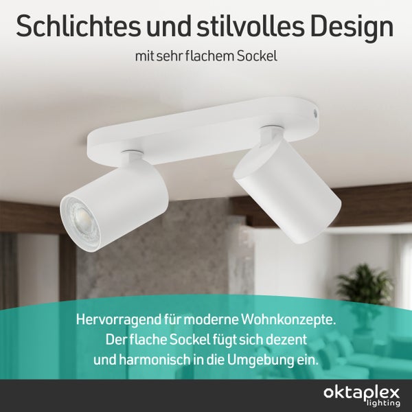 Moderner, 2-flammiger Deckenstrahler mit flachem Sockel und zwei zylindrischen, verstellbaren Spots. oktaplex lighting Logo.