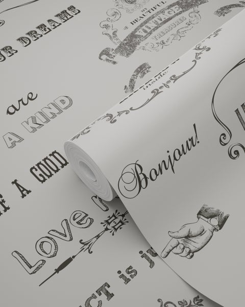 Tapetenrolle mit Schriftzug und Ornamenten