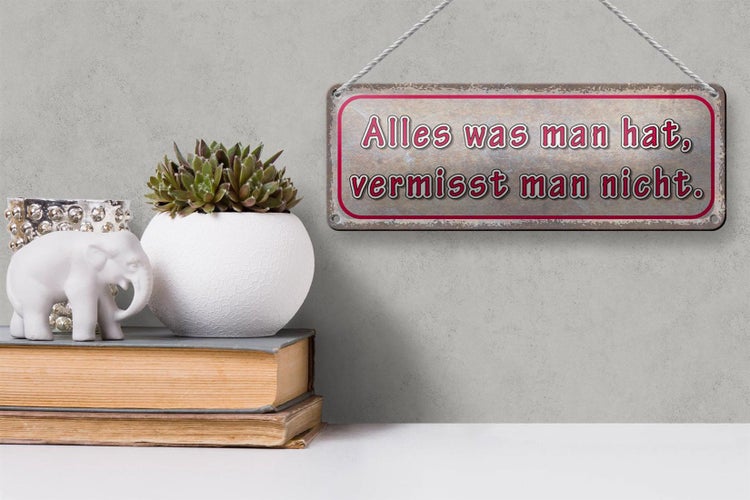 Blechschild Spruch 27x10cm was man hat vermisst man nicht Dekoration