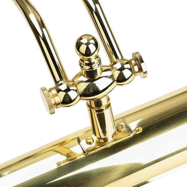 Detail einer goldenen Messinglampe