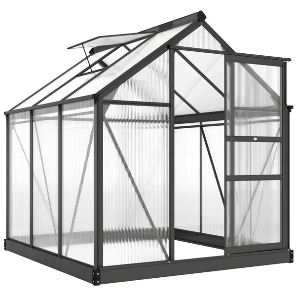 Modernes Gewächshaus mit dunklem Aluminiumrahmen und Hohlkammerplatten im Garten mit Pflanzenregal und Blumen.