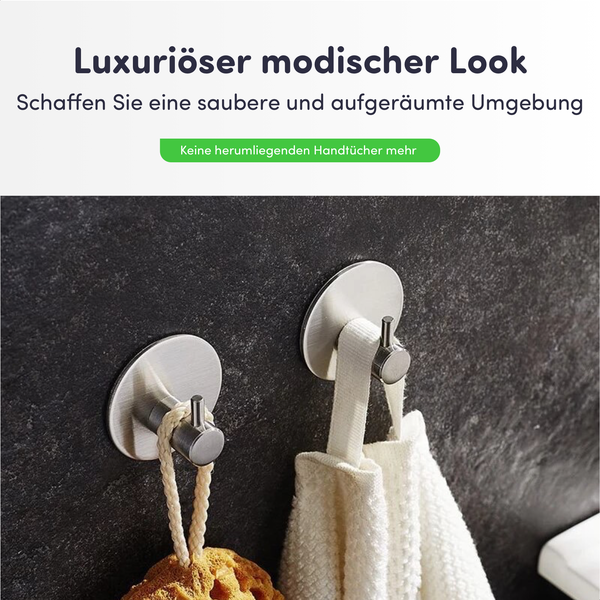 Wandhaken aus gebürstetem Edelstahl für Bad oder Küche, einer mit einem Schwamm und einer mit einem Handtuch.