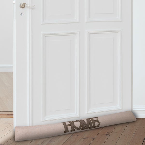 Türstopper mit der Aufschrift Zuhause vor einer Tür