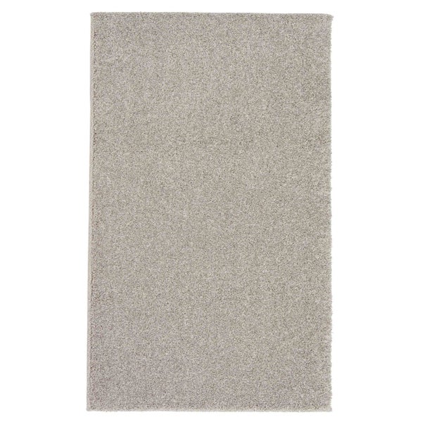 Rechteckiger Kurzflorteppich mit strukturierter Oberfläche in Beige.